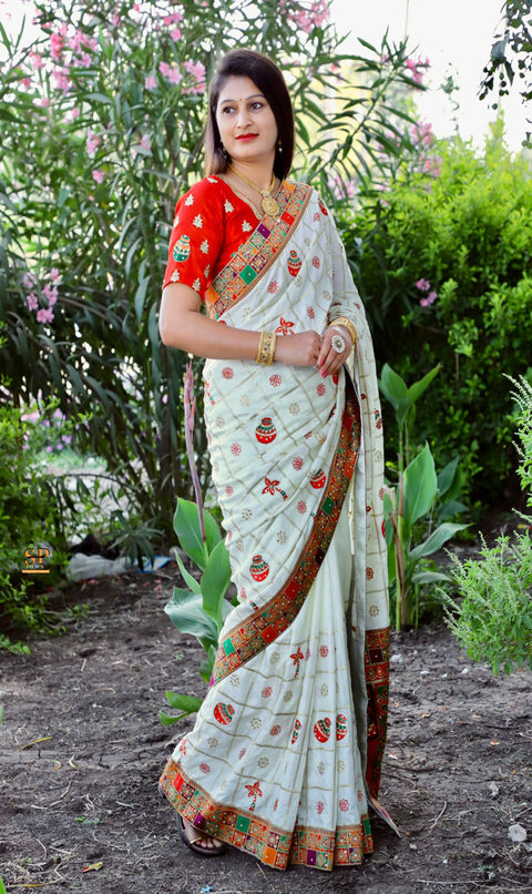 White Color Patola saree is a rich canvas