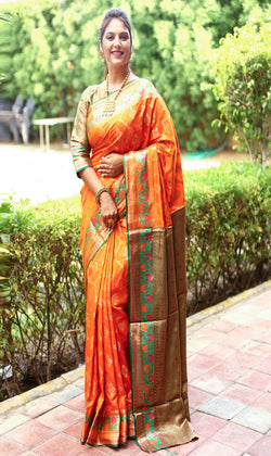 Orange Anmol Zari Woven Soft Silk Saree