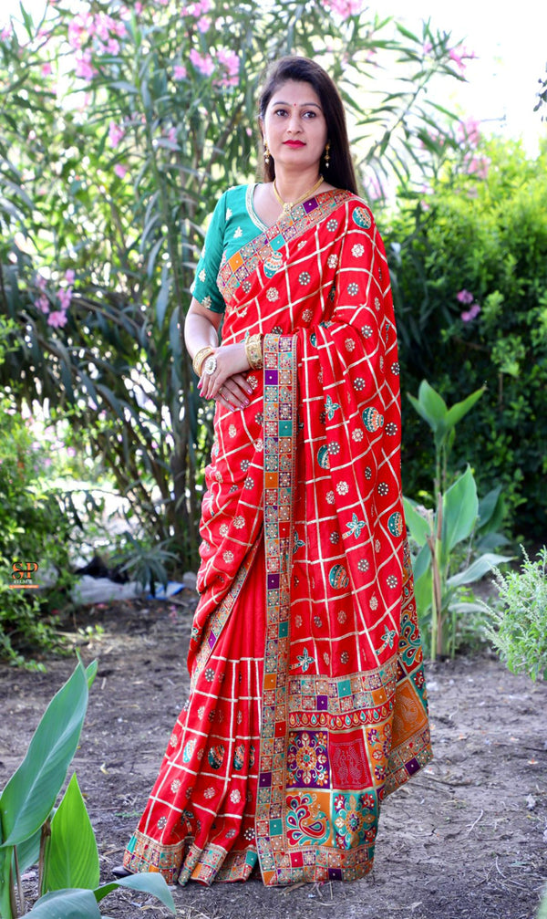 Red Color  Patola saree is a rich canvas