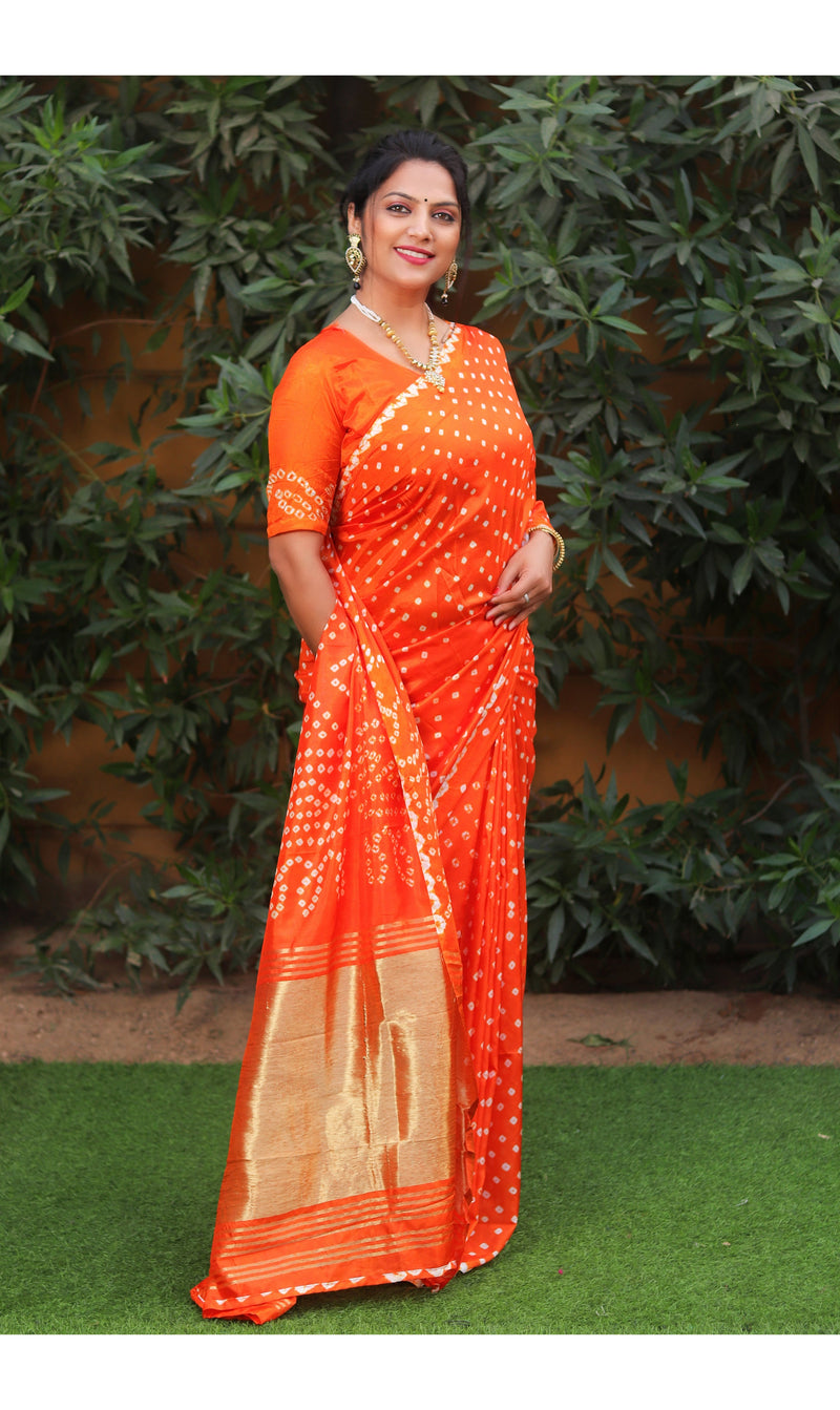 Orange color soft bandhani saree with hand high quality bandhej print