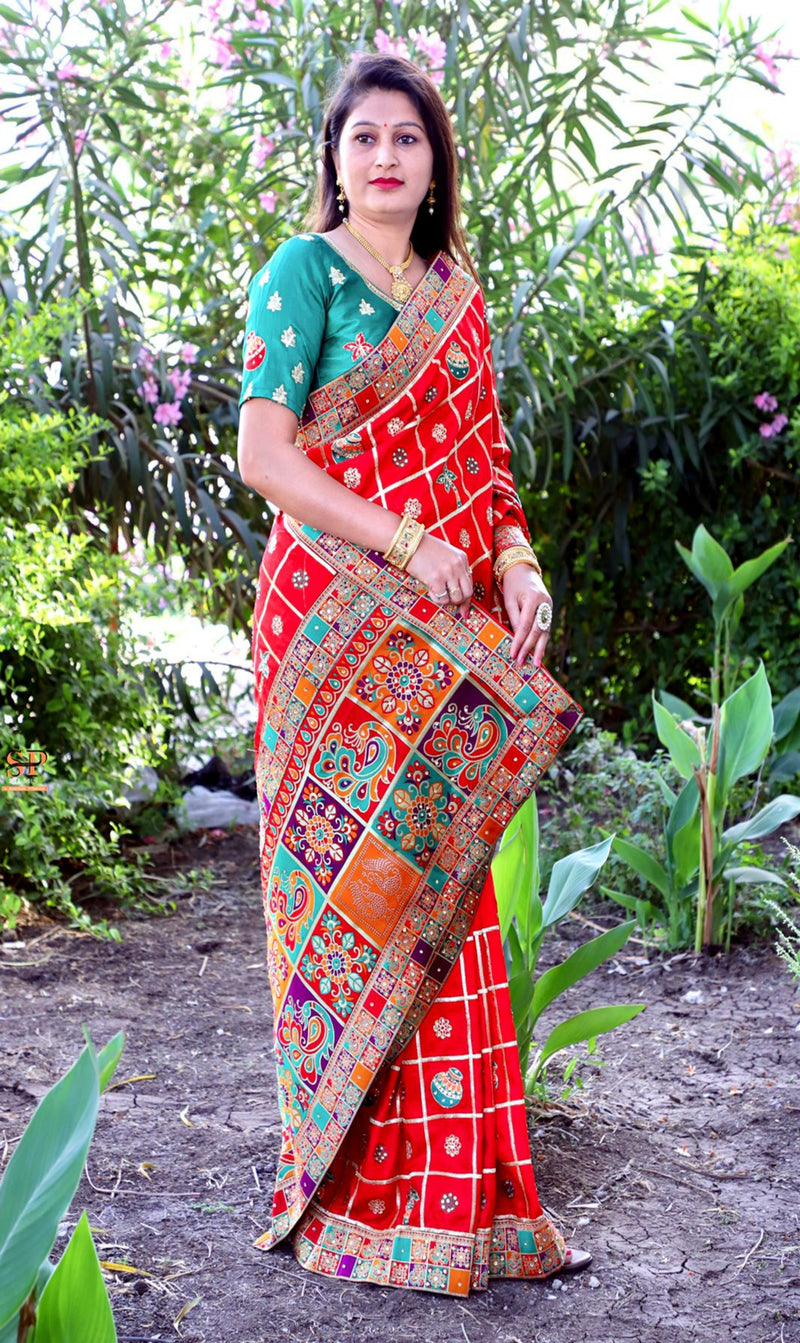 Red Color  Patola saree is a rich canvas