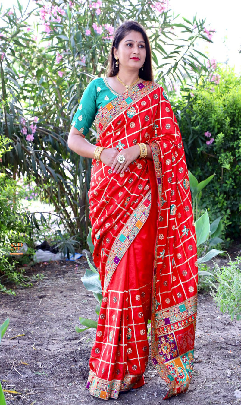 Red Color  Patola saree is a rich canvas