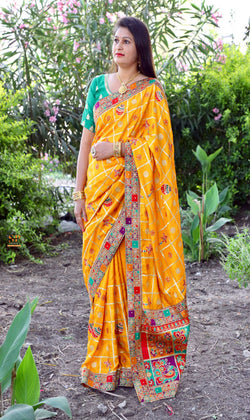 Yellow Color Patola saree is a rich canvas