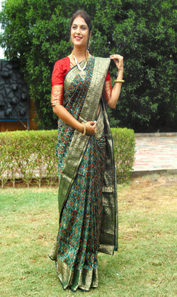 Green Color Special Dazzling Ikkat Patola Silk Saree