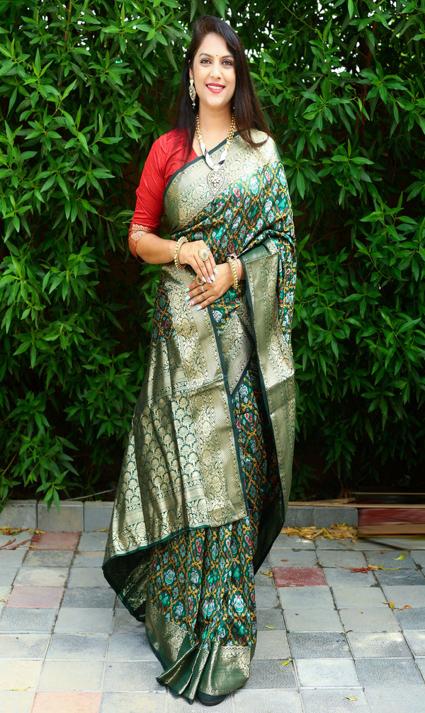 Green Color Special Dazzling Ikkat Patola Silk Saree