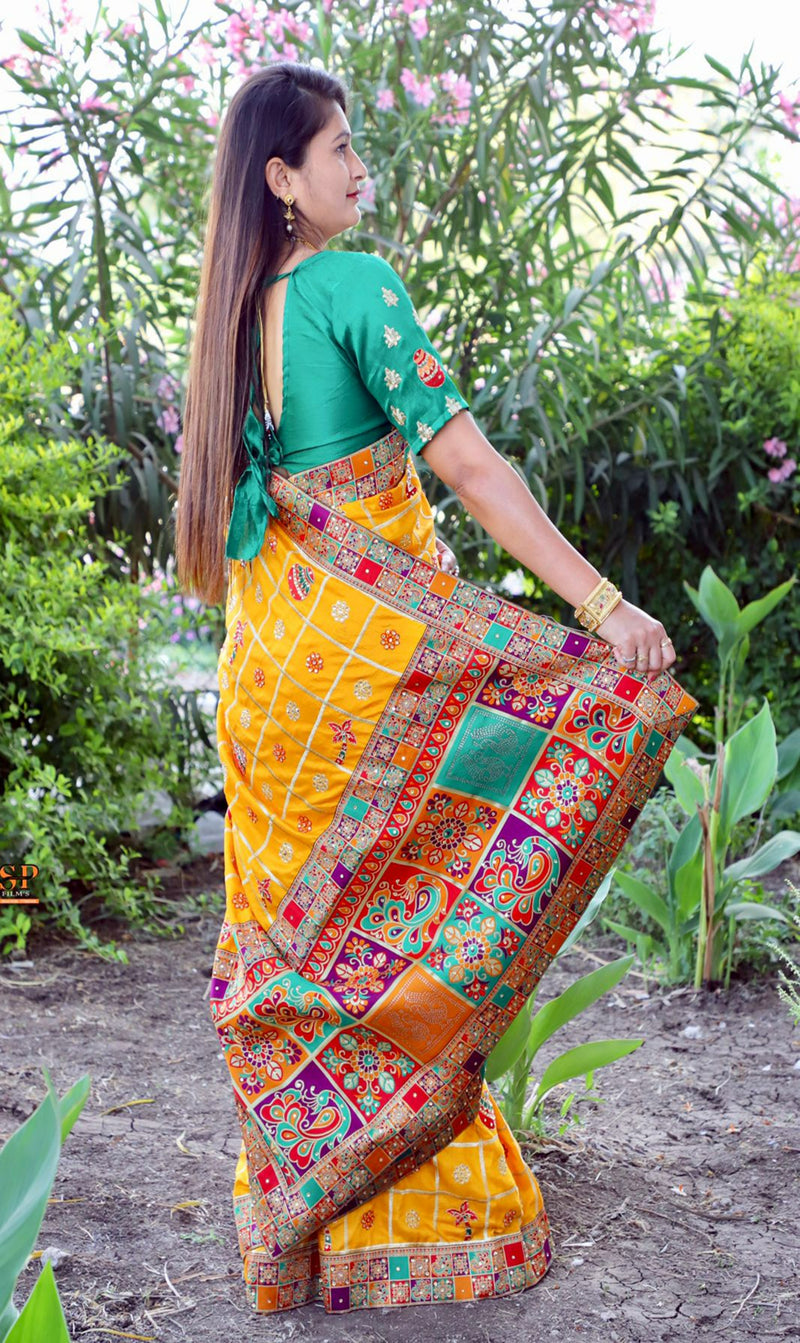 Yellow Color Patola saree is a rich canvas
