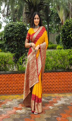 Yellow Maroon Comfortable Bandhej silk drapes with Kanchipuram jari border