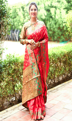 Red Anmol Zari Woven Soft Silk Saree