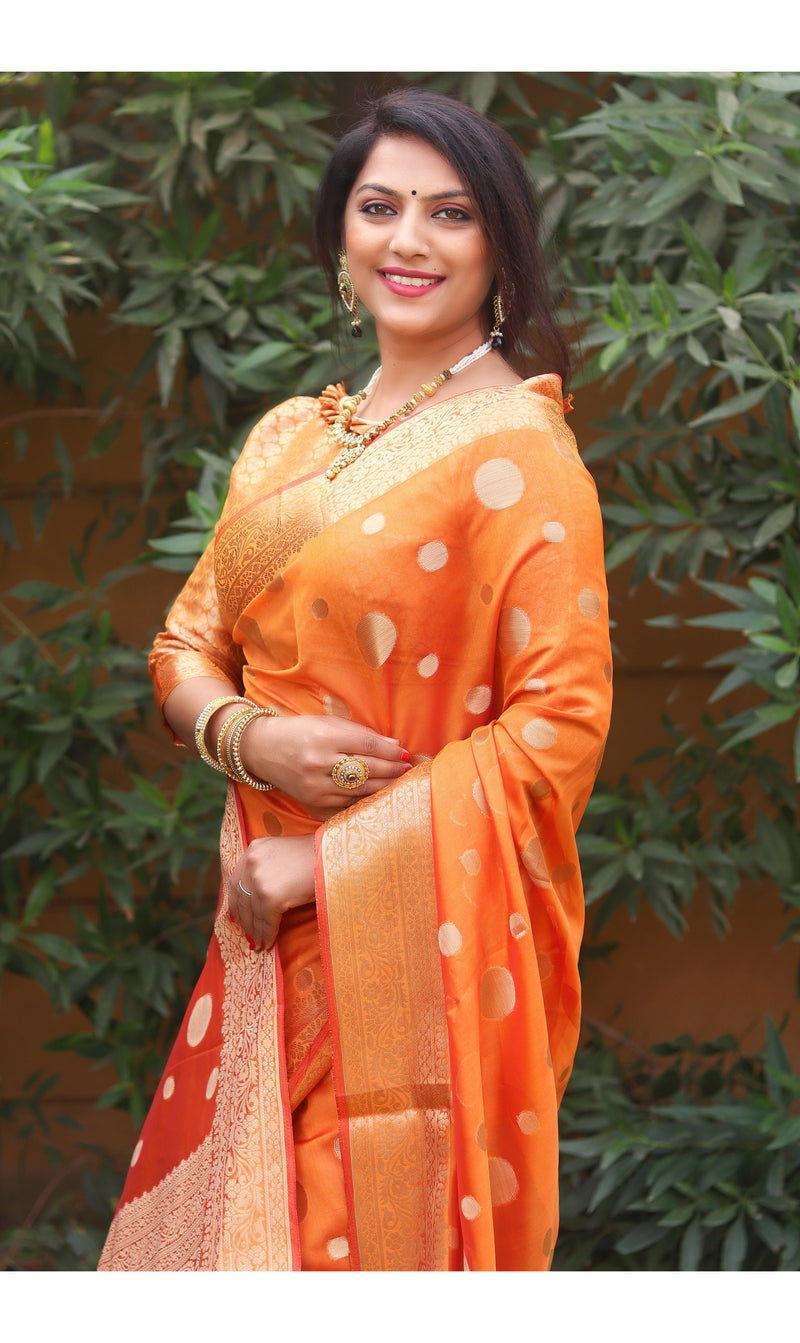 Orange Organza Silk Saree with delicate allover weaving designs