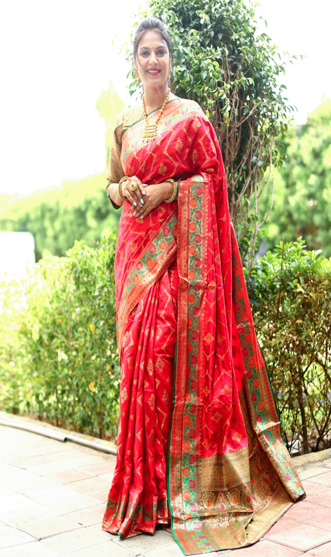 Red Anmol Zari Woven Soft Silk Saree