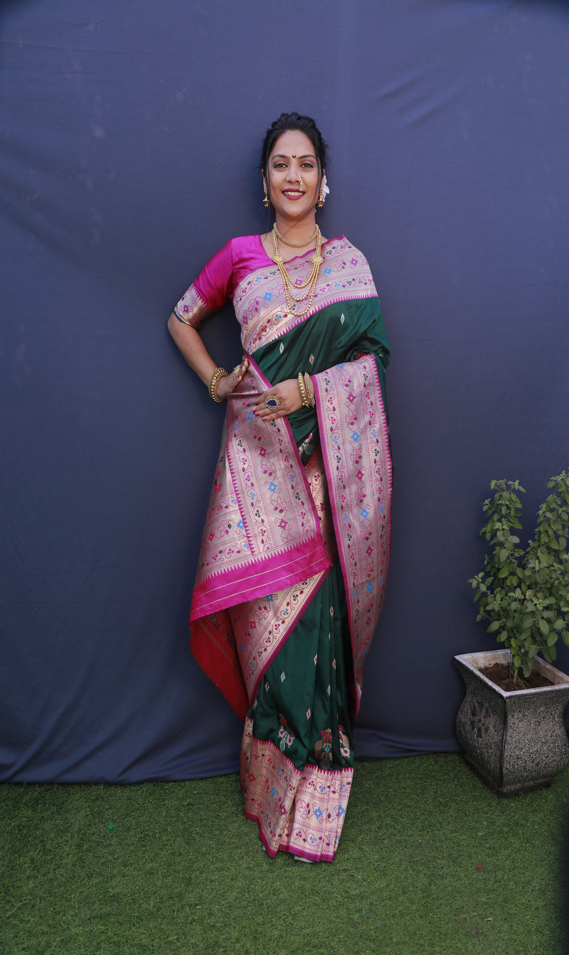 Dark Green color paithani silk saree with golden zari weaving work