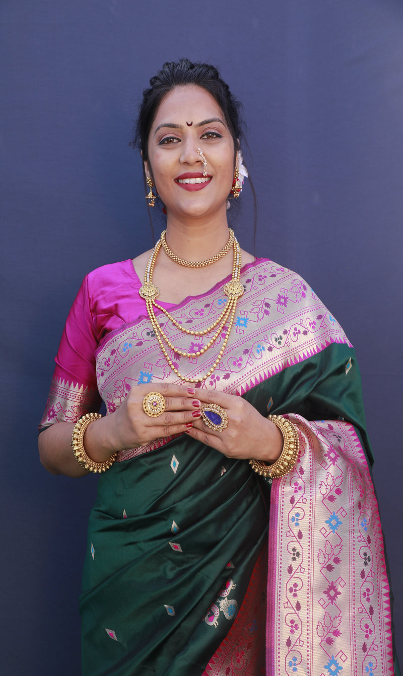 Dark Green color paithani silk saree with golden zari weaving work