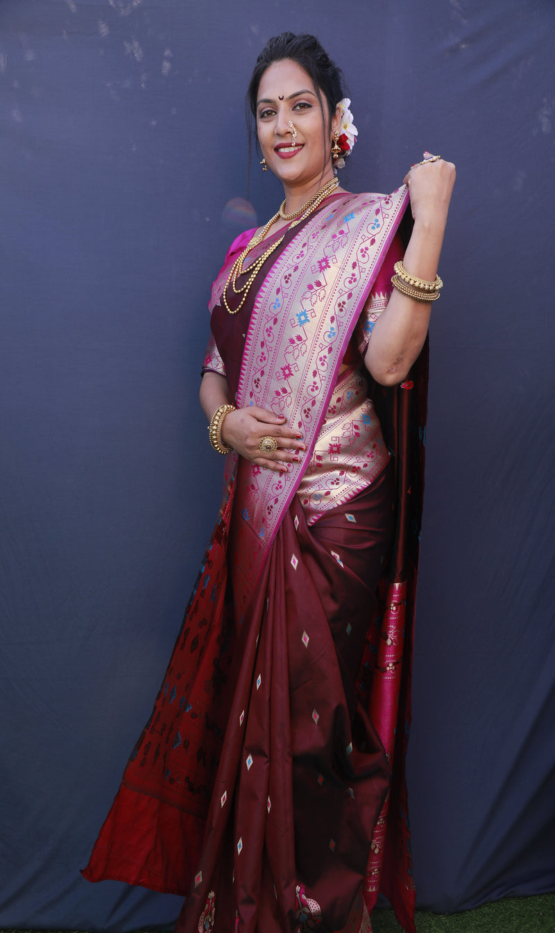 Dark Maroon color paithani silk saree with golden zari weaving work