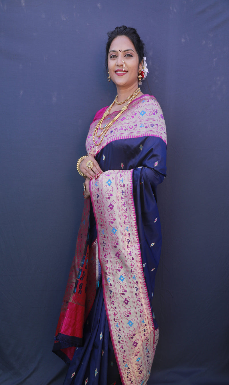 Navy Blue color paithani silk saree with golden zari weaving work