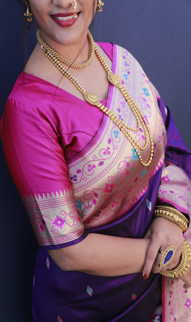 Purple color paithani silk saree with golden zari weaving work