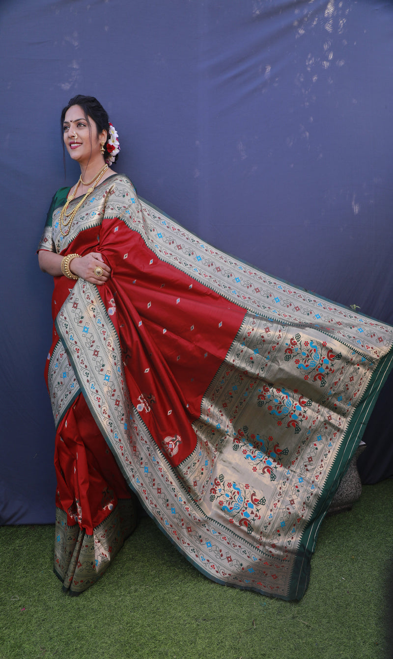 Dark Red color paithani silk saree with golden zari weaving work